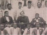 Dr. Ambedkar with prominent social workers of the Independent Labour Party at Bombay in 1936. Seen in the second row (seated) are Mr. R. R. Bole, Afdvocate Gadkari. Dr. Ambedkar, Nanasaheb Tipins of Mahad. Behid them are Mr. Ganpat Mahadev Jadhav (in cap) and on his left is Mr. Ramakrishna Bhatankar, the then MLA of Bombay Legislative Assembly